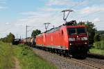Am 08.08.2014 fuhr 185 106-2 zusammen mit 185 103-9 und einem gemischten Güterzug bei Kollmarsreute in Richtung Schweiz.
