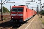 Am 13.08.2014 fuhr 185 054-4 mit einem Containerzug durch Harburg gen Norden.