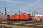 DB Lok 185 011-4 durchfährt den Badischen Bahnhof. Die Aufnahme stammt vom 24.03.2016.
