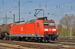 DB Lok 185 089-0 durchfährt den Badischen Bahnhof.