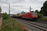 Mit einem gemischten Güterzug fuhr am 09.06.2015 die 185 132-8 durch die Bahnanlagen vom Bahnhof in Müllheim (Baden) in Richtung Basel.