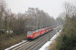 185 072 und andere Loks unterwegs als Lokzug am 29. Januar 2014 in Evesen, einem Ortsteil von Bückeburg.
