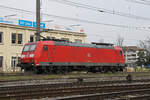 DB Lok 185 087-4 durchfährt am 22.02.2023 solo den Bahnhof Pratteln.