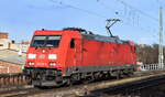 DB Cargo AG, Mainz mit ihrer  185 315-9  [NVR-Nummer: 91 80 6185 315-9 D-DB] am 29.01.24 bei der Vorbeifahrt Bahnhof Magdeburg Neustadt.