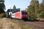 185 194-8 Railion ohne Seitenbeschriftung mit einem Militrzug nach berquerung des Mittellandkanals bei Peine am 26.09.2009 