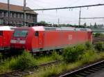 185 097-3 mit Schweiz Paket wartet in Wanne-Eickel Hbf auf ihren nchsten Einsatz.