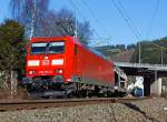 Die 185 174-0 der DB Schenker Rail zieht einen gemischten Gterzug in Richtung Kln, hier am 02.03.2013 in Betzdorf/Sieg bei km 122,8.