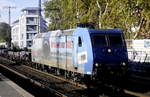 185 512 von CFL-Cargo (91 80 6 185 512-1 D-ATLU) in Köln Süd am 14.10.18. Dieser Werbung wäre Erfolg ja von Herzen zu wünschen.