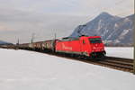 RheinCargo 185 603-8 zieht ein Kesselzug am 21.02.19 bei Oberaudorf in Richtung Kufstein.