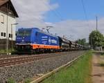 Raildox 185 409-0 mit Schüttgutwagen-Ganzzug in Fahrtrichtung Süden. Aufgenommen in Ludwigsau-Friedlos am 14.05.2016.