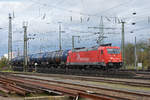 Lok 185 585-7  Rhein Cargo  durchfährt den badischen Bahnhof.