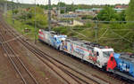 Alle drei Rheincargo-Werbeloks waren am 03.05.20 in Bitterfeld wegen eines Werkstattaufenthalts in Bitterfeld versammelt. Hier sind 185 350, 185 349 und 185 340 auf dem Bitterfelder Stumpfgleis an der Brehnaer Brücke abgestellt.