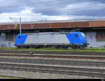 ATLU - Lok 91 80 6 185 536-0 abgestellt in Pratteln am 02.04.2024 .. Standort des Fotografen ausserhalb der Geleisanlagen