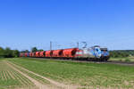 185 350-6 (Rhein Cargo) mit einem Schotterzug in Elze, 28.