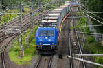 D-EGP 185 303-5 fuhr am 09.06.2026 mit ihrem KLV-G�terzug ((LKW-)Walter-Zug) zum L�becker-Skandinavienkai (ALSK) hier am Abzw.