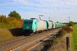 HLG Bombardier Traxx 185 619-4 mit Getreidewagen in Nieder-M�rlen auf der Main Weser Bahn am 16.10.26