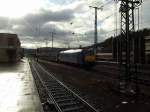 185 515-4 der Connex mit einem Ganzzug bestehend aus Autotransportwagen bei der Durchfahrt in Koblenz.Das Wetter hat ganz schn verrckt gespielt.Bei fast jedem Bild hatte ich ein anderes