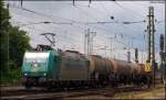 185 543  Transpetrol  mit dem BASF Zug nach Ludwigshafen bei der Ausfahrt von Aachen West 21.6.2009