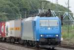 Die unbeschriftete 185 535-2 zieht ihren Containerzug durch Kln West am 11.07.2009