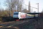 185 666 mit einem Fuballsonderzug am 23.3.10 in Limmer.