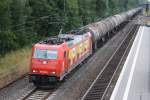 185 586 mit einem Kesselwagenzug am 17.07.2010 in Tostedt