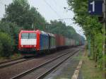 185-CL 003 (z.Zt OHE) + 185 567 (CFL Cargo) mit einem Containerzug am 23.07.2010 durch Radbruch