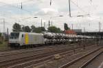 Mit einem Autozug fhrt 185 681-4 von PCT Altmann/Railpool durch Magdeburg-Rothensee in Richtung Stendal. Fotografiert am 24.08.2010. 