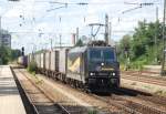 185 574-1 (Alexander Neubauer) mit dem Ewals-Zug am 09.08.2010 durch Mnchen-Heimeranplatz.