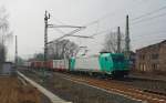 Die von DB Schenker angemietete 185 610-3 mit einem Stahlzug in Fahrtrichtung Norden. Aufgenommen am 01.03.2011 am B Eltmannshausen/Oberhone.