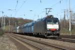185 554-3 mit PKP Fals Wagen in Kln West am 19.03.11