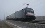 Der MRCE-Taurus 6402 097 mit KLV-Ganzzug auf dem Weg nach Mnchen am Morgen des 24.11.11 bei Hattenhofen.