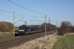 Schwarze Loks fr schwarze Container. 185 567-5 und eine Schwesterlok ziehen einen black-boxX Containerzug auf der KBS 310 in Richtung Braunschweig. Fotografiert am 25.03.2012 in Magdeburg Diesdorf. 