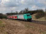 Die 185 618 mit einer S Bahn nach Neumarkt Oberpfalz am 24.03.2012 unterwegs bei Plling.