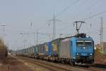  Crossrail Mietlok 185 527 am 22.3.12 mit einem LKW Walter von Duisburg Ruhrort nach Italien bei der Durchfahrt durch Ratingen-Lintorf.