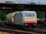 Railpool 185 636-8 zieht am 10.07.2012 einen Getreidezug aus Richtung Kln kommend durch das Gleisvorfeld von Aachen West.