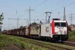 Lokomotion/Kombiverkehr 185 665 am 25.5.12 mit der EWS 92 034 und vielen Schrottwagen auf dem Weg von Gelsenkirchen-Bismarck nach Mnchen Trudering.Der Zug lief unter der Zugnummer DGS 12345 (kein Scherz ;-))
Gru an den Tf!