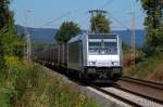 185 697-0 mit dem Namen  Jolina  ist am 09.09.2012 mit dem Nievenheimer-Aluzug (DGS 69128) zwischen Himmighausen und Langeland unterwegs und passiert die ehem.