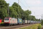 Crossrail 185 597 am 26.6.12 mit einem LKW-Walter nach Duisburg Ruhrort in Ratingen-Lintorf.