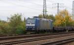 Die 185 CL-009 der VPS bringt leere Flachwagen fr Stahlrollen in das Gterumschlagszentrum in Hamm/Westfalen. Hier bei der langsamen Durchfahrt durch den HBf Hamm. Am 26.10.2012.