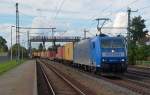 Mit einem Containerzug nach Leipzig-Wahren durchfährt 185 511 am 14.10.14 Niederndodeleben.