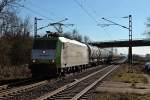 Durchfahrt am 20.02.2014 von Captrain 185 541-0 mit einem leerem GATX-Kesselwagenzug in Orschweier gen Norden.