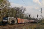 MRCE/NIAG 185 554 am 27.3.14 mit einem leeren Kohlezug in Ratingen-Lintorf.