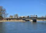 185 673 mit einem Getreidezug am 20.03.2014 bei Plattling. 