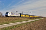 185 540-2 fährt in Thüngersheim mit einem ARS Altmannzug vorüber.Bild vom 14.3.2016