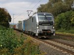 193 803-4 und Wagenlok 185 716-8 mit Containerzug in Fahrtrichtung Süden. Aufgenommen in Wehretal-Reichensachsen am 30.09.2014.