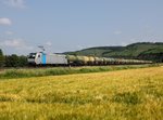 Die 185 673 mit einem Kesselzug am 06.07.2013 unterwegs bei Himmelstad.