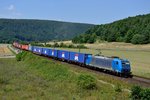 Gut ausgelastet war am 18. Juli 2014 der Metrans-Containerzug 42879 von Hamburg nach Salzburg, geführt von 185 510. Aufgenommen werden konnte die Leistung bei Harrbach.