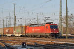 Lok 185 595-6 durchfährt den Badischen Bahnhof. Das abzweigende Gleis führt auf einen Parkplatz, von wo aus auch diese Aufnahme am 18.01.2017 entstand.