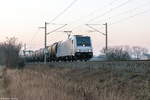 185 690-5 Railpool GmbH mit einem Kesselzug  Umweltgefährdender Stoff, flüssig  in Nennhausen und fuhr weiter in Richtung Wustermark am 15.02.2017.