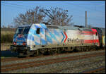 RHC 185 350-6  Grenzenlos für Sie im Einsatz  beförderte am 19.03.2026 einen Autoteilezug bei Winterhausen durch das Maintal gen Norden.